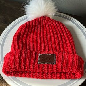 Wore once Love Your Melon Pom hat.